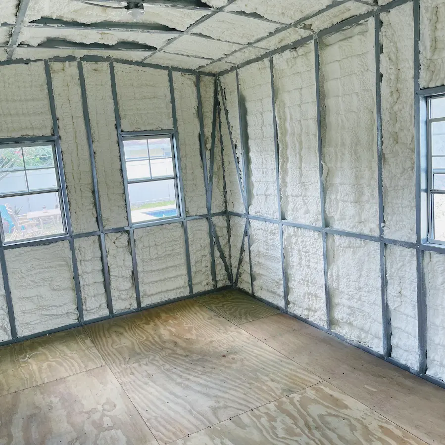 Closed-cell spray foam insulation applied to wall cavities in a residential project in Kilgore
